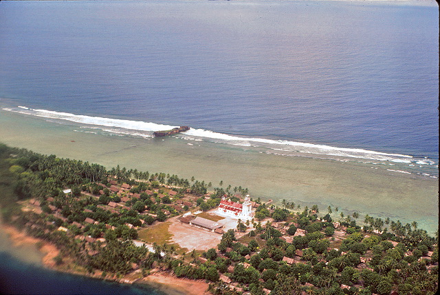 Nanumea showing village and landing craft from SeeBee plane by Peter